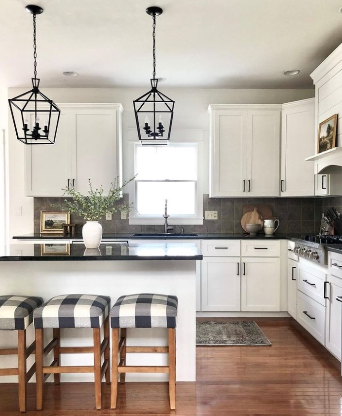 white kitchen black appliances