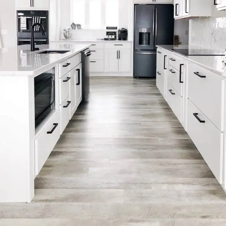 white kitchen black appliances