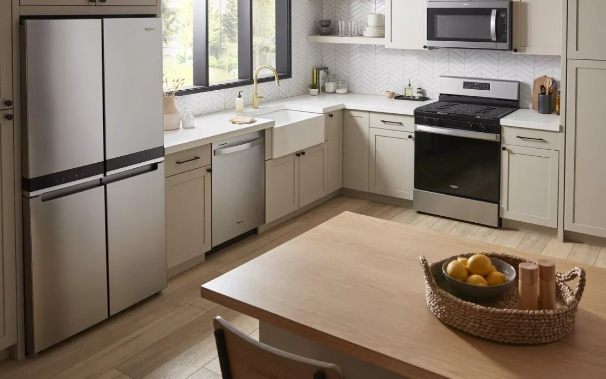 white kitchen black appliances