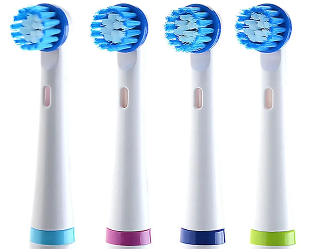 how to clean electric toothbrush heads