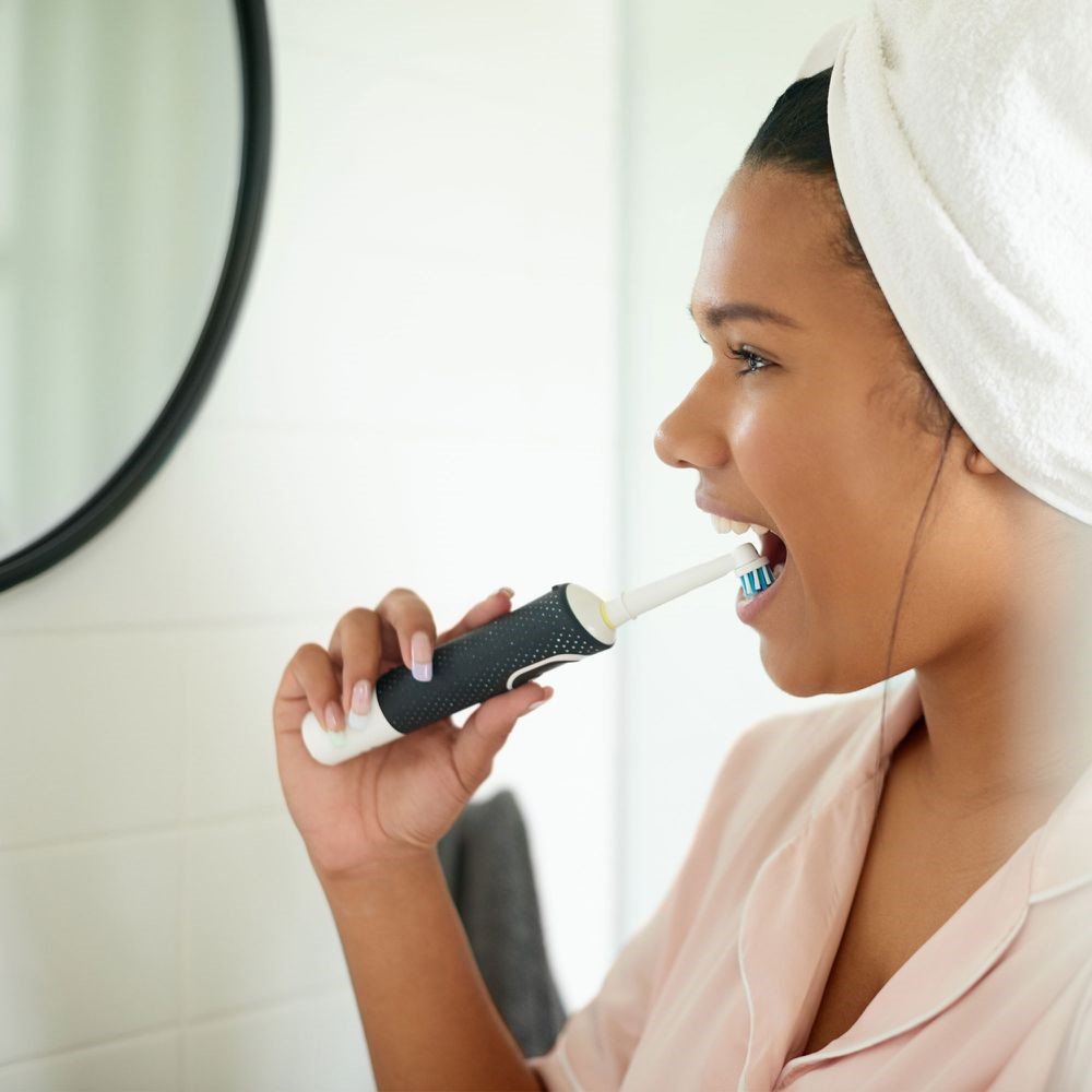 brush tongue with electric toothbrush