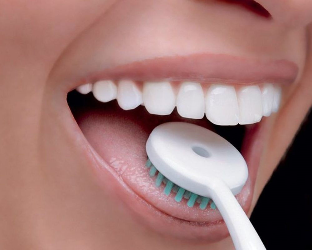 brush tongue with electric toothbrush