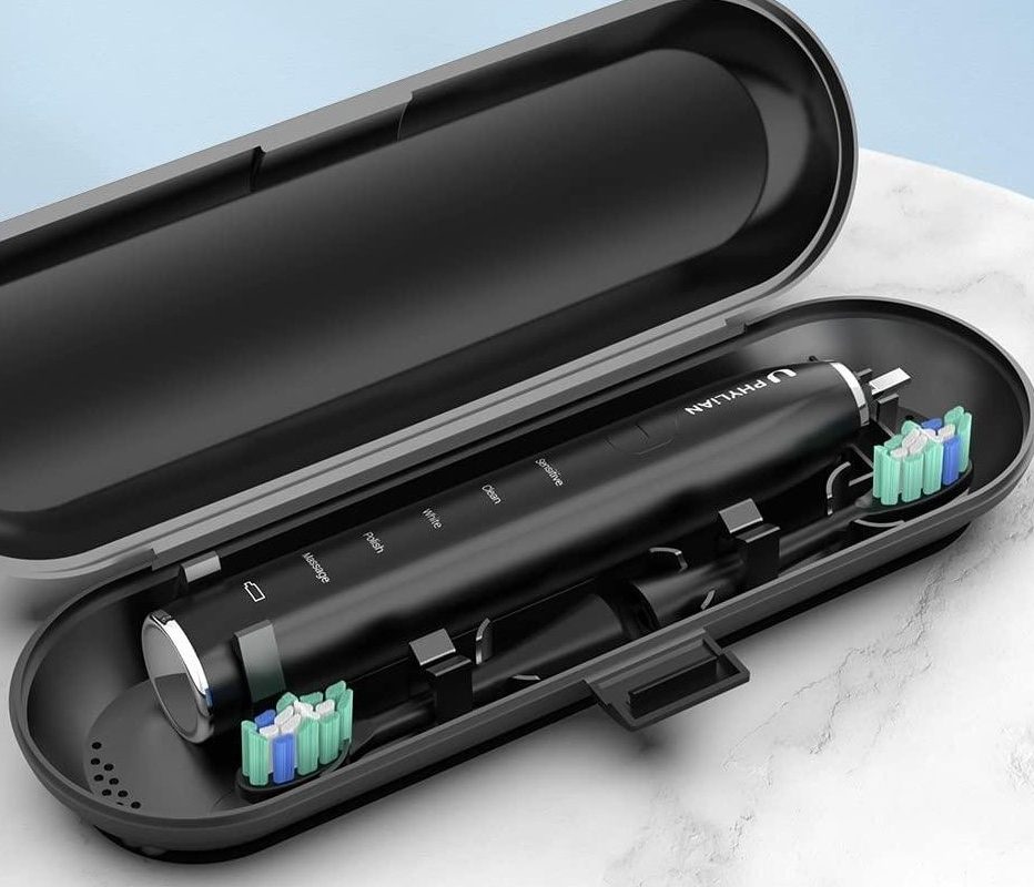 take an electric toothbrush in checked luggage