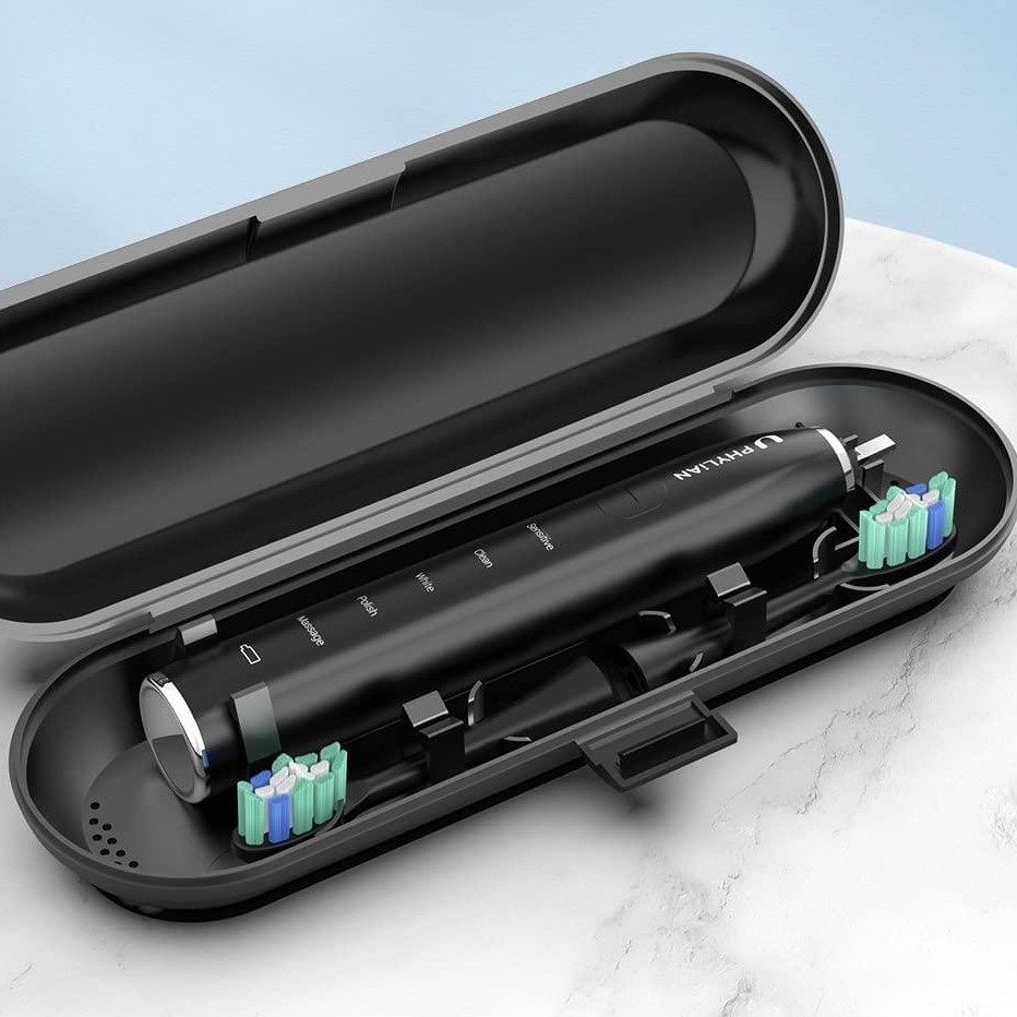 take an electric toothbrush in checked luggage