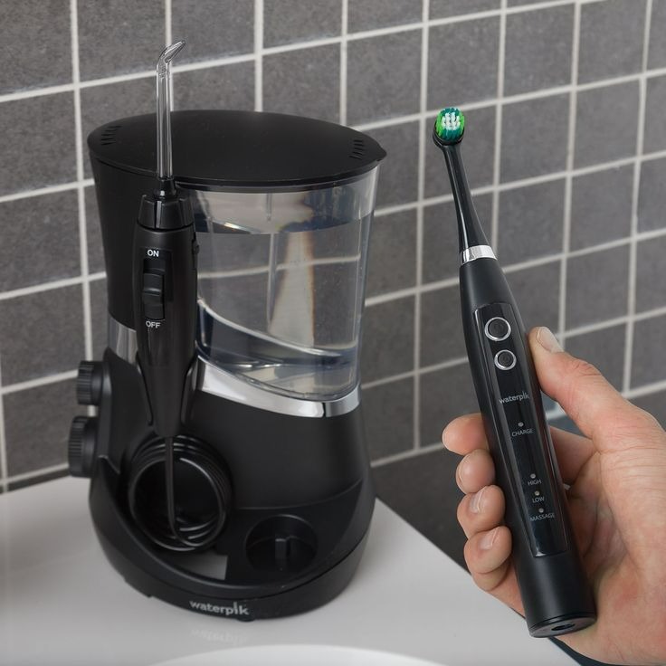 electric toothbrush with water flosser